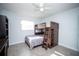 Cozy bedroom featuring a unique bunk bed with built-in storage and rustic ladder at 11071 141St St, Largo, FL 33774