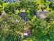 Residential property with ample lawn space and adjacent treed area for privacy and shade at 11109 Winn Rd, Riverview, FL 33569
