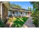 Charming single story home featuring stone accents, a cozy front porch, and well-manicured lawn at 11109 Winn Rd, Riverview, FL 33569