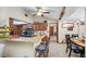 Bright kitchen with granite countertops and stainless appliances; dining area adjacent at 11109 Winn Rd, Riverview, FL 33569