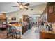 Spacious kitchen with granite countertops, stainless appliances, and an eat-in bar with seating at 11109 Winn Rd, Riverview, FL 33569
