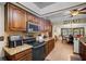 Beautiful kitchen featuring granite countertops, wooden cabinetry, and stainless steel appliances at 11109 Winn Rd, Riverview, FL 33569