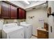 Convenient laundry room with a washer, dryer, and additional storage cabinets at 11109 Winn Rd, Riverview, FL 33569