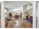 Spacious living room with hardwood floors, elegant furniture, and natural light at 11109 Winn Rd, Riverview, FL 33569