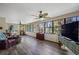 Bright sunroom with lots of windows overlooking the backyard at 11109 Winn Rd, Riverview, FL 33569