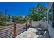 Cozy balcony with chairs overlooking a tree-lined street on a sunny day at 112 W Sligh Ave, Tampa, FL 33604