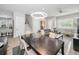 Open concept dining room and living room with modern decor and recessed lighting at 112 W Sligh Ave, Tampa, FL 33604