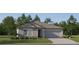 Beautiful single-story home with a well-manicured lawn and charming gray siding at 12442 Radiant Crystal Rose, Parrish, FL 34219