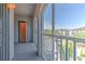 Screened balcony with views of the community and additional storage area for the unit at 13025 Sanctuary Cove Dr # 301, Temple Terrace, FL 33637