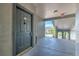 A secure exterior door at the entrance features a matte black finish with modern hardware at 13025 Sanctuary Cove Dr # 301, Temple Terrace, FL 33637