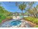 Community hot tub, pool, and clubhouse at the Preserve at Palmaire at 13025 Sanctuary Cove Dr # 301, Temple Terrace, FL 33637