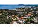 Panoramic aerial view showcasing waterfront property, the city skyline, and luxury residential neighborhood at 132 Giralda Ne Blvd, St Petersburg, FL 33704