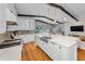 Modern kitchen with stainless steel appliances, marble counters, and an island at 132 Giralda Ne Blvd, St Petersburg, FL 33704