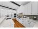 Bright kitchen featuring stainless appliances, marble counters, and ample cabinet space at 132 Giralda Ne Blvd, St Petersburg, FL 33704