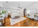 Bright bedroom with an area rug, ceiling fan, and hardwood flooring at 132 Giralda Ne Blvd, St Petersburg, FL 33704