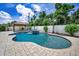 Backyard pool area with a jacuzzi and a gazebo at 132 Giralda Ne Blvd, St Petersburg, FL 33704