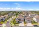 Aerial view of the neighborhood showcasing well-maintained homes, landscaping, and community streets at 13859 Sharp Hawk Dr, Riverview, FL 33569