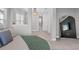 Spacious bedroom featuring unique mirror and hallway view with decorative lighting at 13859 Sharp Hawk Dr, Riverview, FL 33569