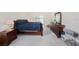 Bright bedroom with a large bed, and views to the backyard at 14181 Cornewall Ln, Spring Hill, FL 34609
