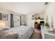 Bedroom featuring a window, closet, and desk with shelves at 14181 Cornewall Ln, Spring Hill, FL 34609