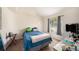 Bedroom with natural light, ceiling fan, and neutral carpet at 14181 Cornewall Ln, Spring Hill, FL 34609