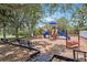 Fun-filled playground featuring colorful slides, swings, and climbing structures for children to enjoy at 14181 Cornewall Ln, Spring Hill, FL 34609