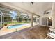 Enclosed pool area with plenty of space for entertaining or relaxing at 14181 Cornewall Ln, Spring Hill, FL 34609