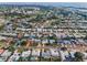 Panoramic aerial view of a residential neighborhood near the water and surrounding landscape at 14341 Passage Way, Seminole, FL 33776