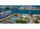 Aerial view of Imperial Point featuring tennis courts, a pool, clubhouse, and marina access at 14341 Passage Way, Seminole, FL 33776