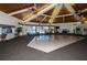 Spacious clubhouse with high ceilings, dance floor, and pool view, ideal for community events and social gatherings at 14341 Passage Way, Seminole, FL 33776