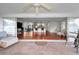 Covered patio provides seamless indoor-outdoor living, connecting the interior spaces at 14341 Passage Way, Seminole, FL 33776
