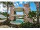 Stunning tiered water feature with lush landscaping at Imperial Point in Clearwater, Florida at 14341 Passage Way, Seminole, FL 33776