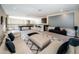 A spacious game room is equipped with a wet bar, pool table, and projector screen for entertainment and relaxation at 14806 Harry Colt Ct, Tampa, FL 33626