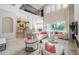 Bright and spacious living room with high ceilings, a large window, and an open-concept design at 14806 Harry Colt Ct, Tampa, FL 33626
