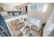 An expansive open floor plan with living room, kitchen, and dining area provides ample space for entertaining at 14806 Harry Colt Ct, Tampa, FL 33626