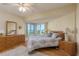 This bedroom boasts water views from the bay window, hardwood floors, and ample storage space at 1500 Sunset Rd # C10, Tarpon Springs, FL 34689