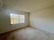 Bedroom features include a large window for natural light at 1510 Mission Hills Blvd # 19-F, Clearwater, FL 33759