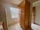 Efficient kitchen includes tile flooring and generous cabinet space for storage at 1510 Mission Hills Blvd # 19-F, Clearwater, FL 33759