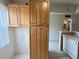 Ample cabinet space available in this kitchen featuring a tiled floor at 1510 Mission Hills Blvd # 19-F, Clearwater, FL 33759