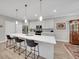 Modern kitchen features stainless appliances, a large island with seating, and eat in kitchen at 1528 Highland Park Dr, Clearwater, FL 33756