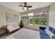 Bright sun room with comfortable seating and natural light, perfect for relaxation at 1528 Highland Park Dr, Clearwater, FL 33756