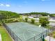 Aerial view of a community basketball court with well-maintained surface and surrounding landscaping at 18320 Snowdonia Dr, Land O Lakes, FL 34638