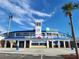 Exterior shot of TD Ballpark, home of the Toronto Blue Jays, set against a clear blue sky at 2048 Douglas Ave, Dunedin, FL 34698