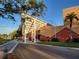 Exterior shot of the Dunedin Fine Art Center with geometric designs and lush landscaping at 2048 Douglas Ave, Dunedin, FL 34698