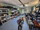 Functional garage with organized storage and bicycle parking at 2048 Douglas Ave, Dunedin, FL 34698