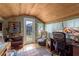 Home office space featuring stained glass, desk area and ample natural light at 2048 Douglas Ave, Dunedin, FL 34698