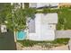 Beautiful home with a metal roof, a private pool, and waterfront access at 2084 Massachusetts Ne Ave, St Petersburg, FL 33703