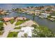 A picturesque aerial view of a waterfront home on a tranquil canal community at 2084 Massachusetts Ne Ave, St Petersburg, FL 33703