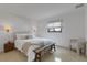 Comfortable bedroom with modern decor, bright natural light, and terrazzo floors at 2084 Massachusetts Ne Ave, St Petersburg, FL 33703