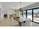 Open dining room with access to outdoor pool area, bright and airy design at 2084 Massachusetts Ne Ave, St Petersburg, FL 33703
